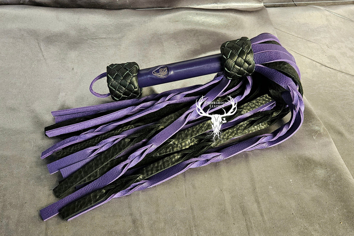 Purple and black Bullhide flogger