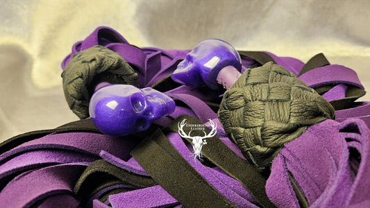 Skull ball handle floggers in purple and black