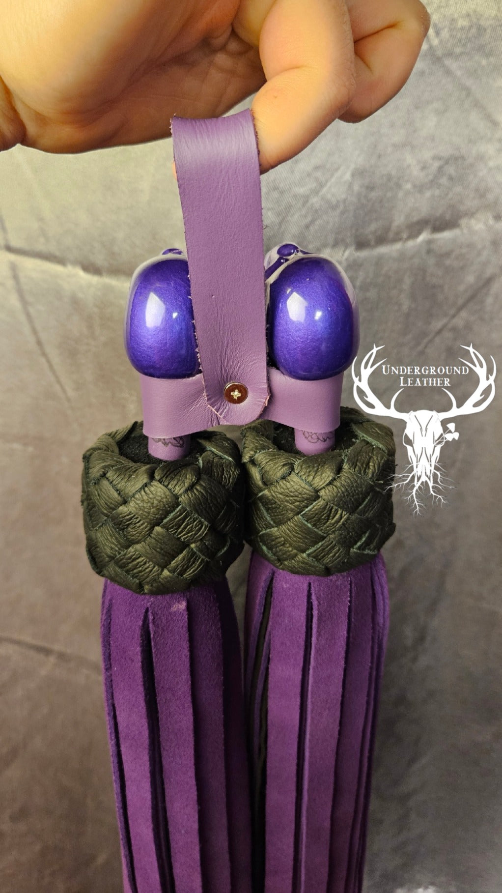 Skull ball handle floggers in purple and black