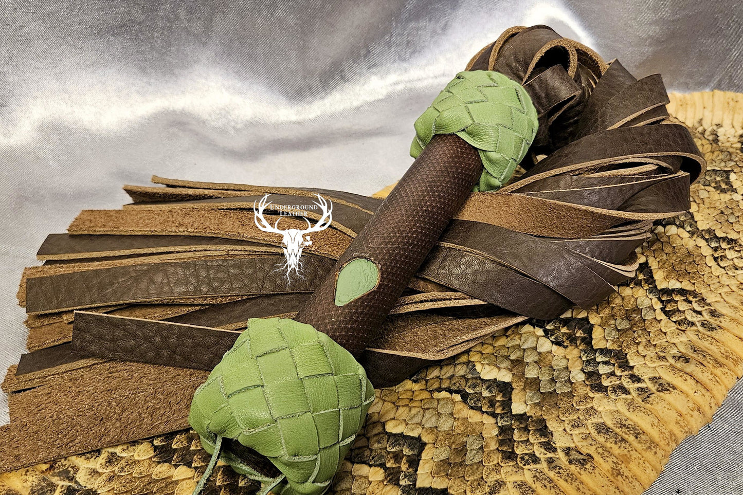 Green and Brown Python Flogger