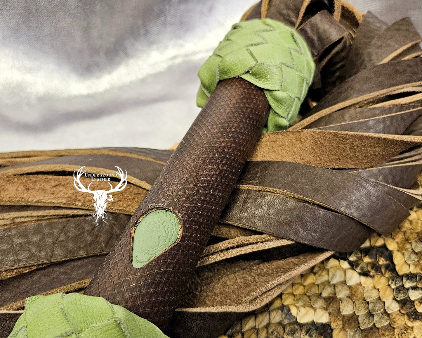 Green and Brown Python Flogger