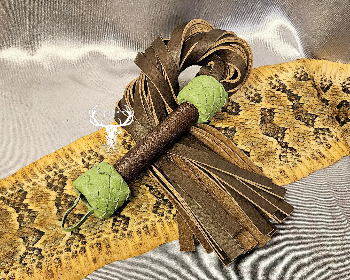 Green and Brown Python Flogger