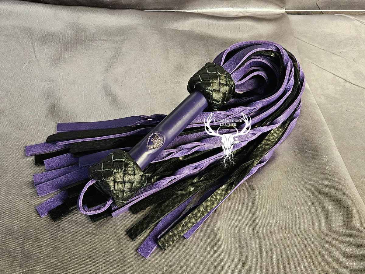 Purple and black Bullhide flogger