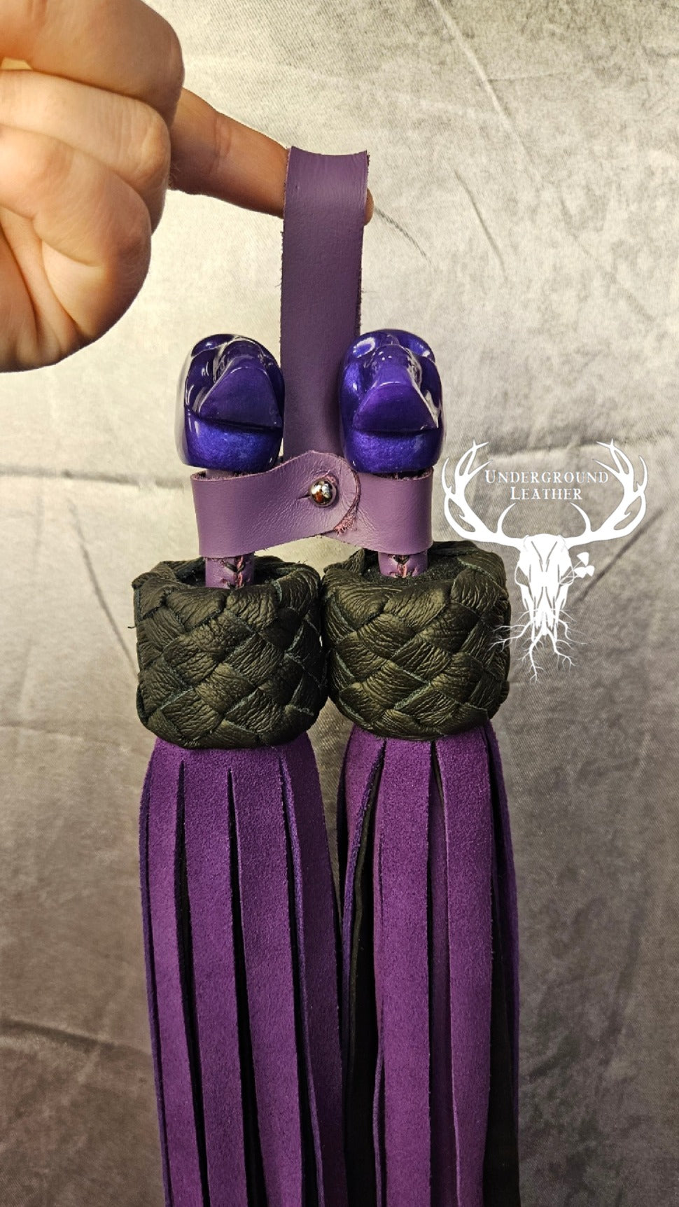 Skull ball handle floggers in purple and black